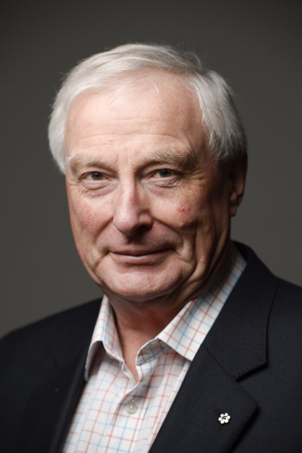 Picture of a white man looking at the camera