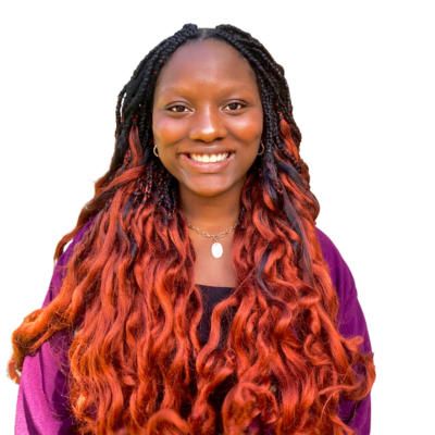 A headshot of a black woman with black and orange braids on a white background